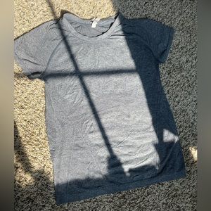 a gray athletic shirt